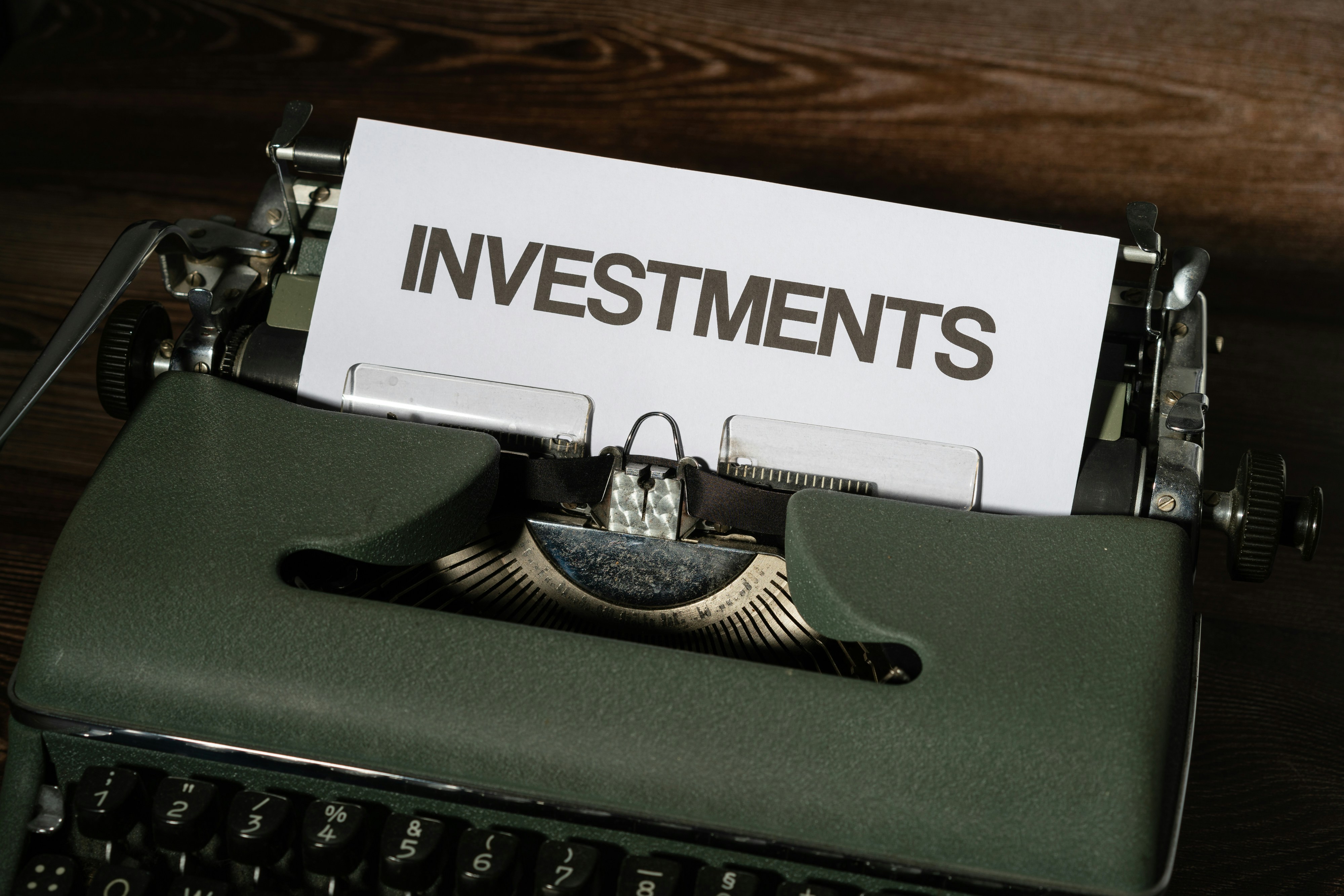 Investment word on a typewriter